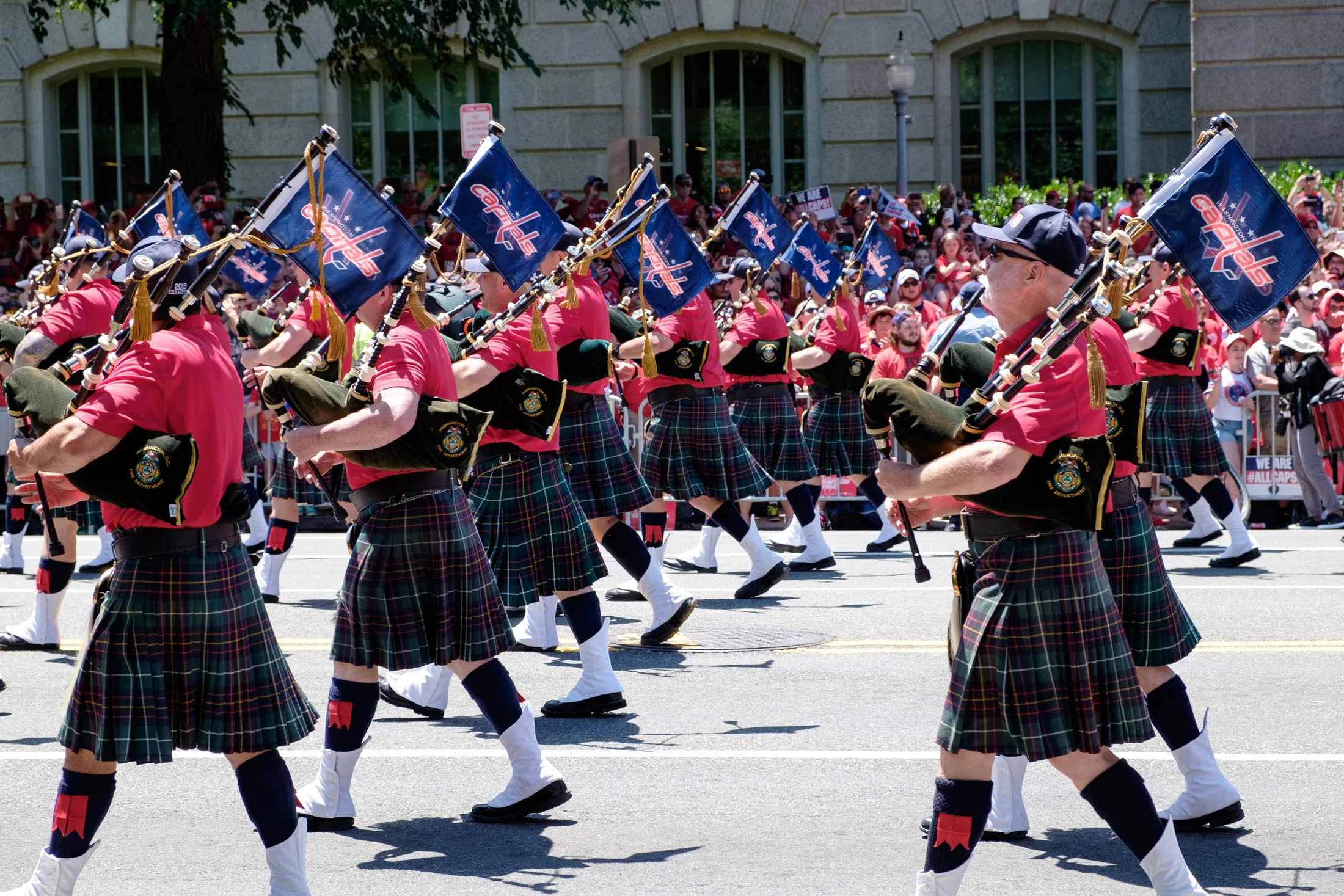 Men in skirts… playing bagpipes